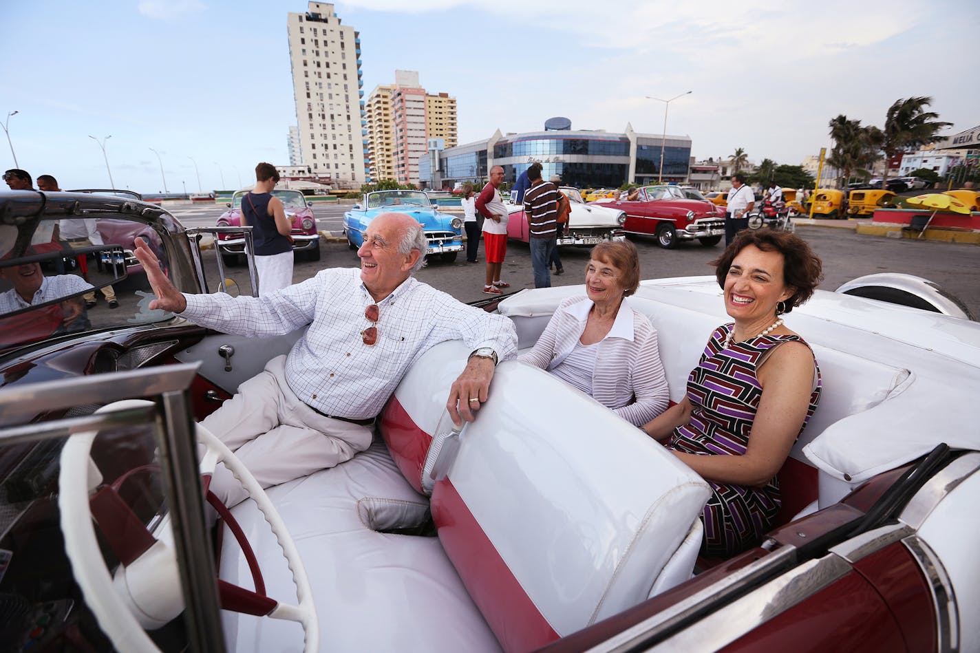 Stanley and Luella Goldberg, from left, and Ellen Luger of the People to People Tour group from Minnesota departs for dinner in a vintage Chevy BelAir outside of the Melia Cohiba Hotel in Havana, Cuba on Friday.