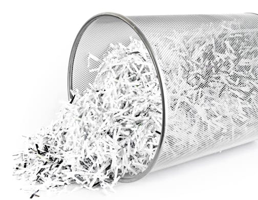 istockphoto shredded paper in waste basket