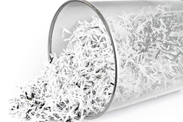 istockphoto shredded paper in waste basket