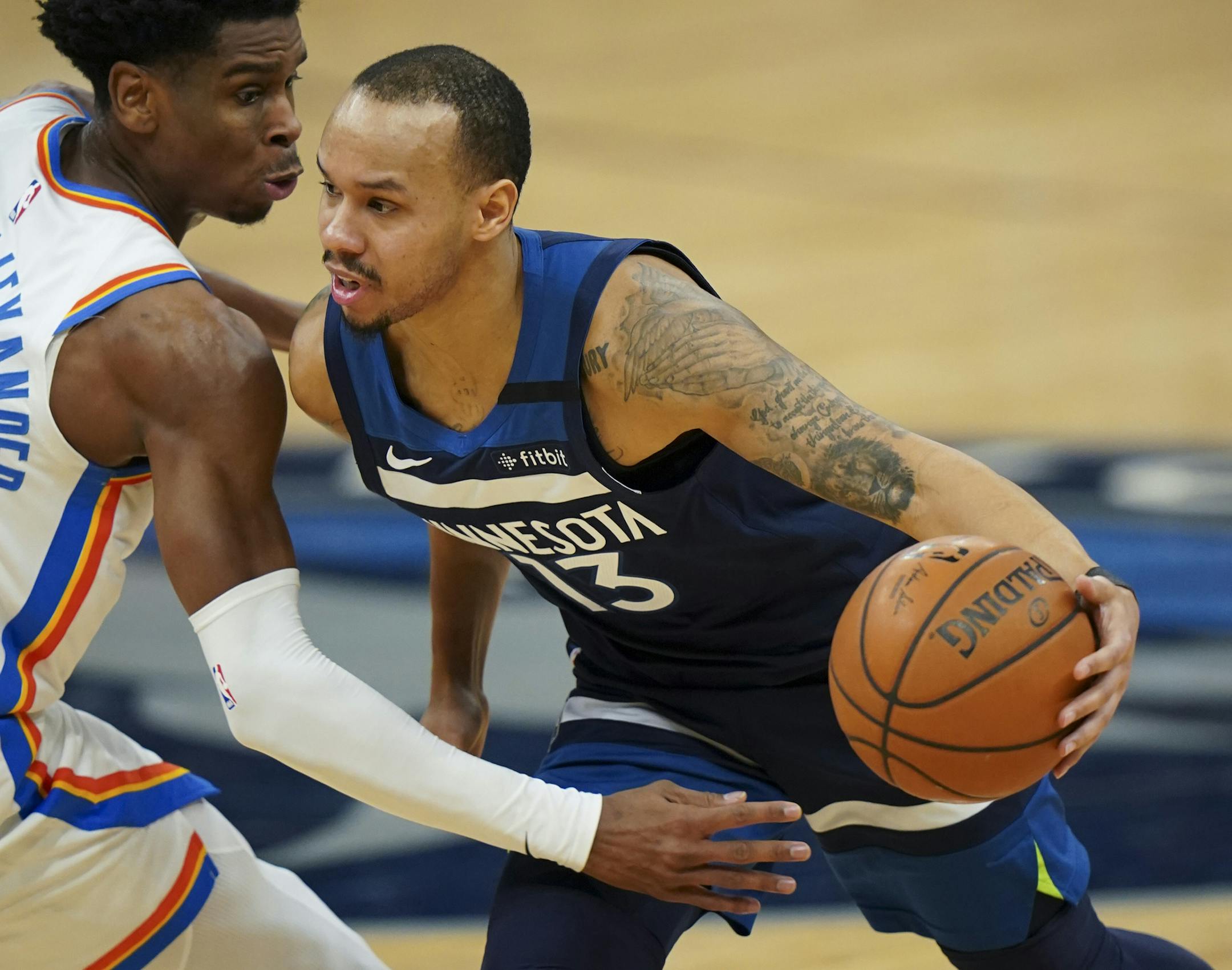 Minnesota Timberwolves guard Shabazz Napier (13) drove around Oklahoma City Thunder guard Shai Gilgeous-Alexander (2) in the third quarter. ] JEFF WHEELER &#x2022; Jeff.Wheeler@startribune.com The Minnesota Timberwolves lost to the Oklahoma City Thunder 117-104 in an NBA basketball game Monday night, January 13, 2020 at Target Center in Minneapolis.