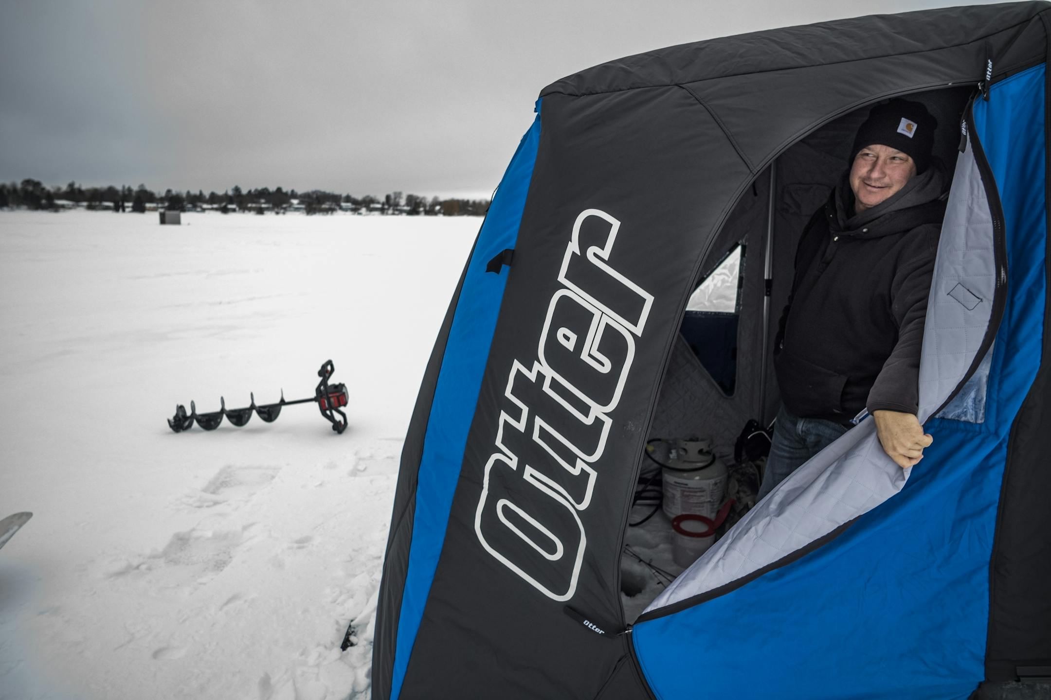 Eli Bimberg, 47 is renting a house on Lake Bemidji and spending his two-month break as a lineman to ice fish. He approves of the ban on refugee settlement in Beltrami County.