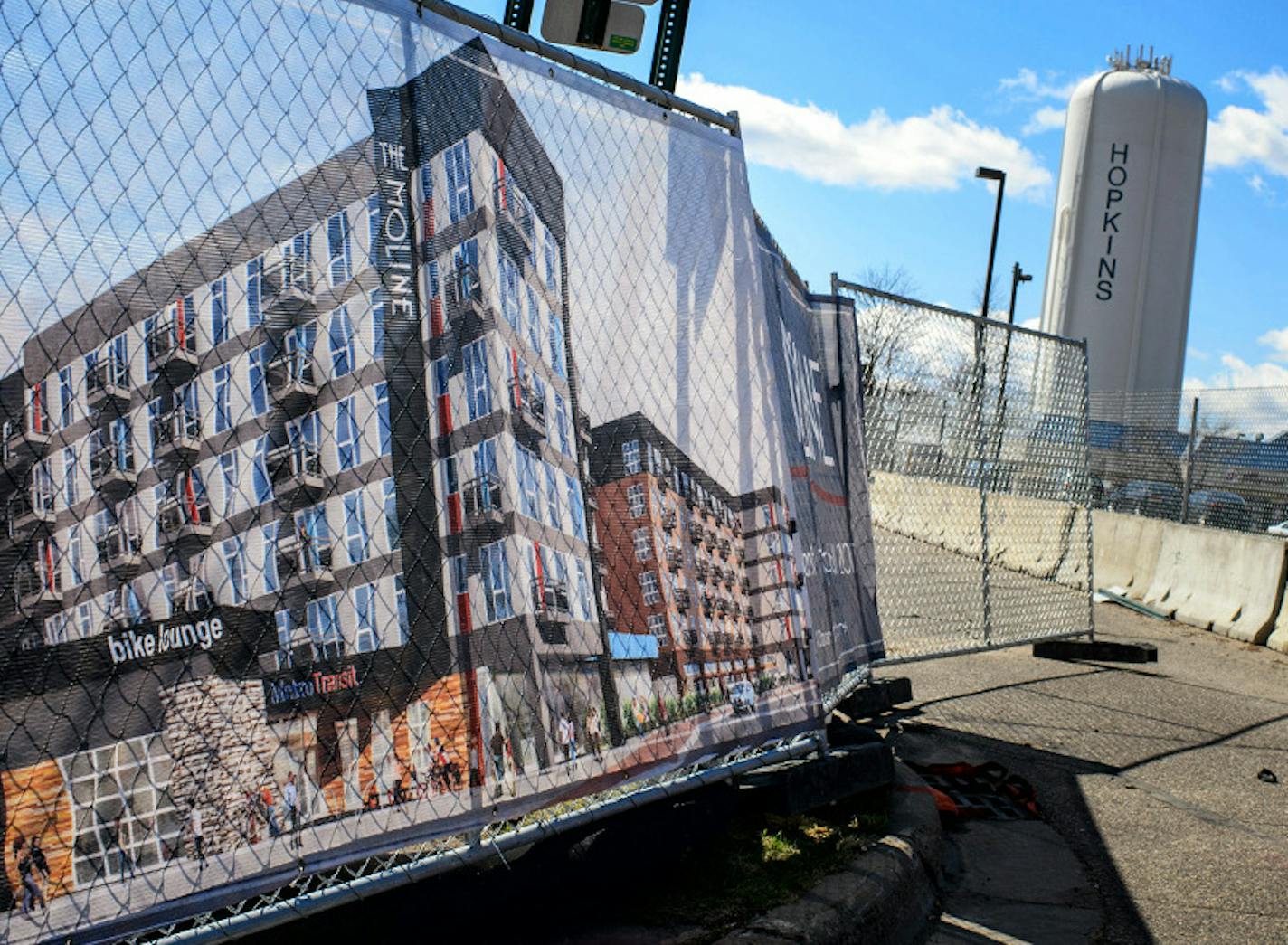 New apartments are going up at Excelsior Boulevard and 8th Avenue in Hopkins, near the Southwest light-rail line's proposed route.