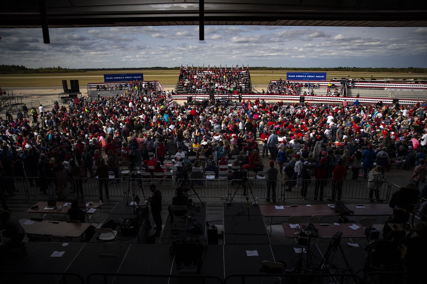 Thousands of Trump supporters piled into Bemidji Aviation Services on Friday for a chance to see the president speak at a campaign event. Some supporters slept in their car Thursday night.