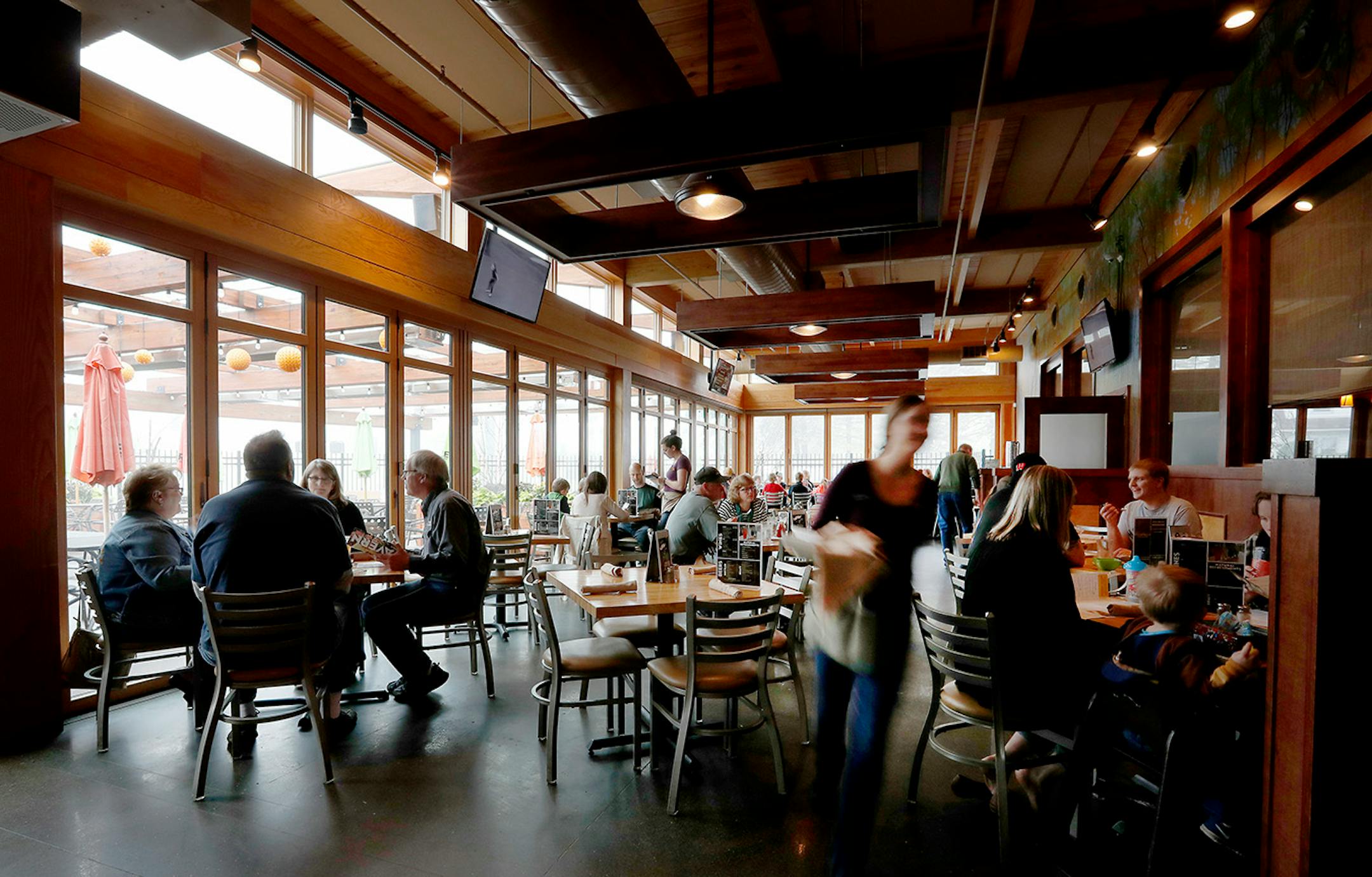 The patrons in the indoor patio at Tavern on the Hill in Duluth.