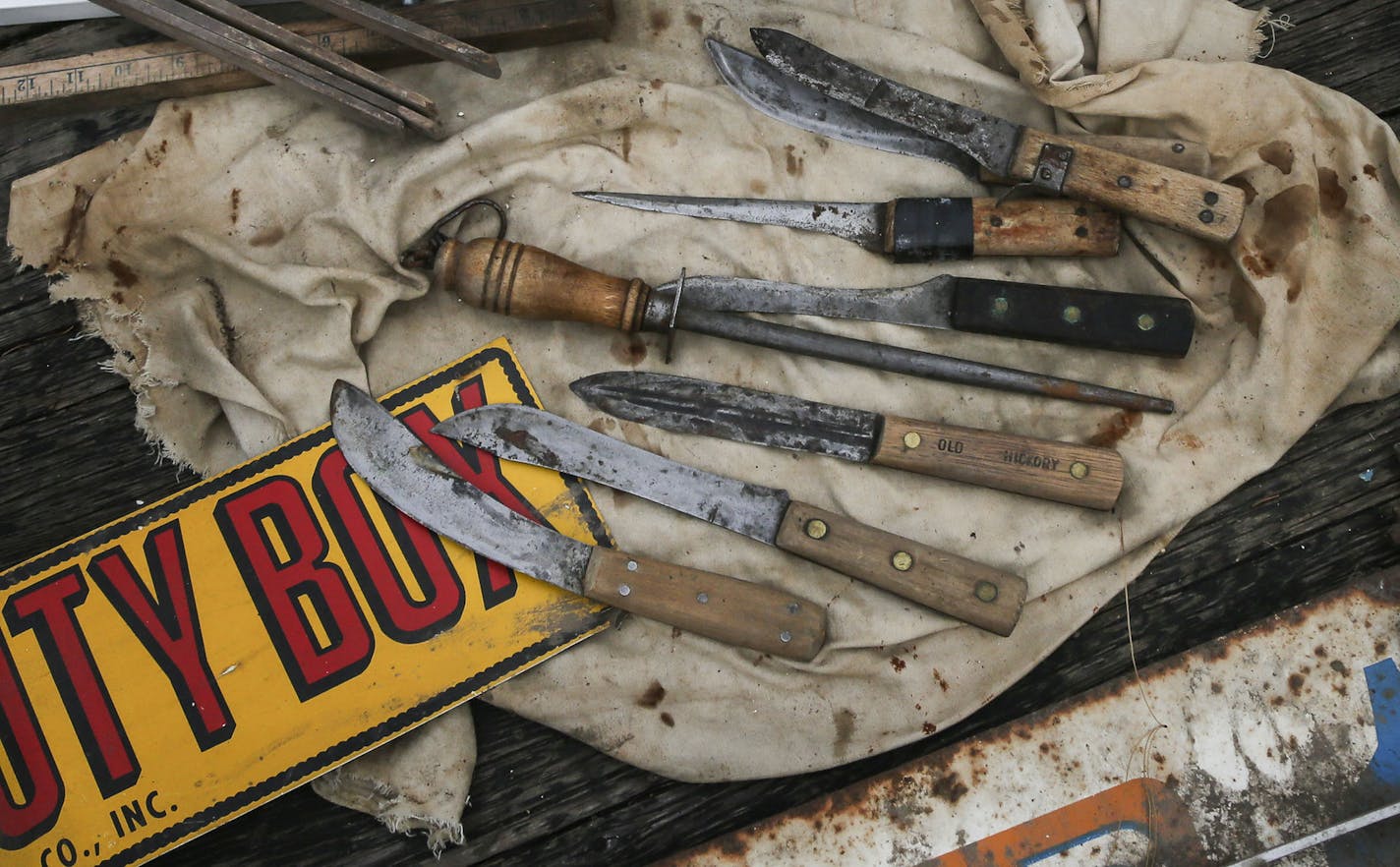 Wayne Schilling, a fifth-generation farmer in Woodbury, and his wife, Betty, auctioned off all their farm equipment and machinery Saturday, Oct. 3, 2014, in Woodbury. An old butcher set of knives was among the items sold.](DAVID JOLES/STARTRIBUNE)djoles@startribune.com Wayne Schilling, a fifth-generation farmer in Woodbury, has sold the last 130 acres of the family farm and one of the last farms in Woodbury to developers. Wayne and his wife, Betty, auctioned off all their farm equipment and mach