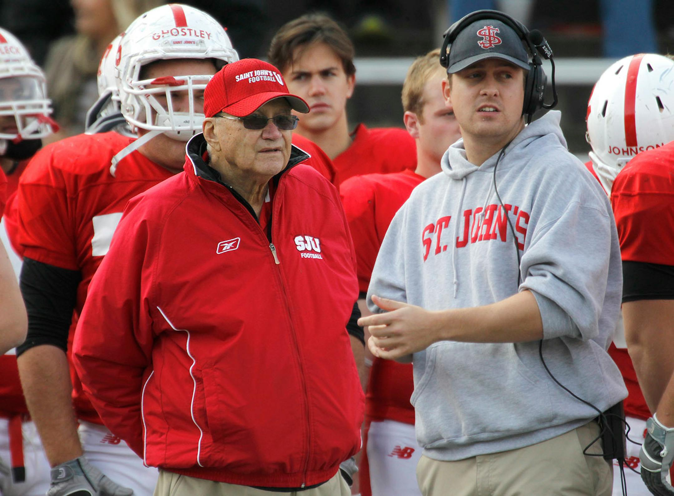 John Gagliardi relayed messages to other coaches through coach Charlie Welch (with headset).