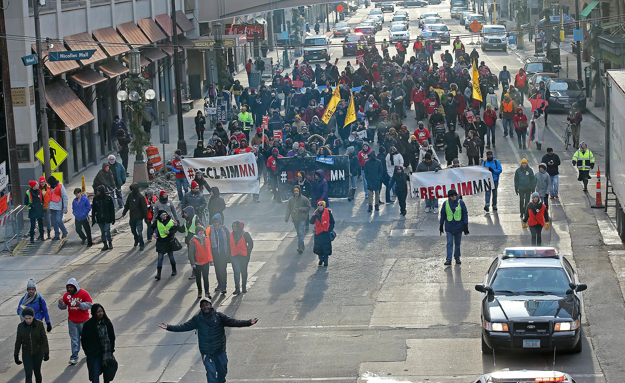 Protesters supporting janitors seeking higher pay and more sick time took to the streets, blocking downtown streets and causing massive traffic jams, Thursday, February 18, 2016 in Minneapolis, MN. ] (ELIZABETH FLORES/STAR TRIBUNE) ELIZABETH FLORES • eflores@startribune.com