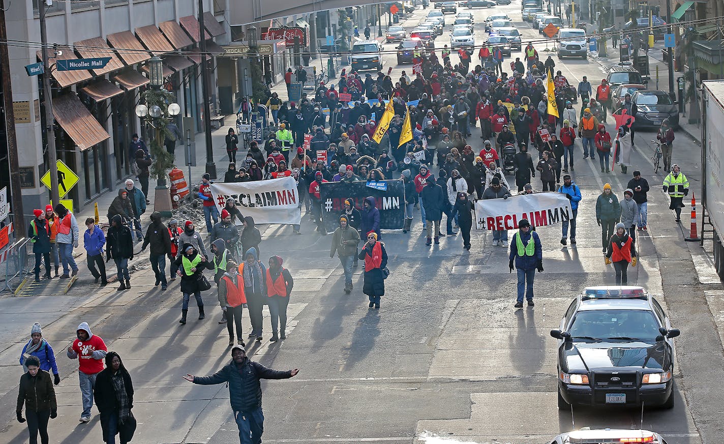 Protesters supporting janitors seeking higher pay and more sick time took to the streets, blocking downtown streets and causing massive traffic jams, Thursday, February 18, 2016 in Minneapolis, MN. ] (ELIZABETH FLORES/STAR TRIBUNE) ELIZABETH FLORES &#x2022; eflores@startribune.com