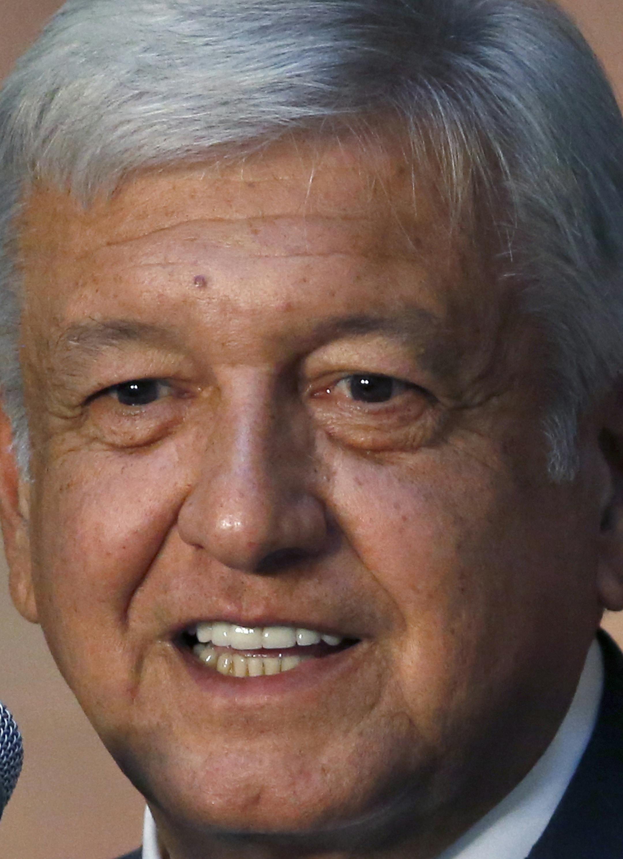 Mexico's President-elect Andres Manuel Lopez Obrador speaks to reporters after meeting with Mexico's President Enrique Pena Nieto at the National Palace in Mexico City, Tuesday, July 3, 2018. The president-elect met with the current leader to discuss his transition to office in December, aiming to ensure an orderly transfer of power after a heated and polarizing campaign. (AP Photo/Marco Ugarte) ORG XMIT: MXMU113