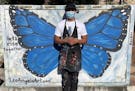 LeoAngelo Lacuna Reyes stood in front of a butterfly he painted on an electrical box that had been tagged with graffiti. 