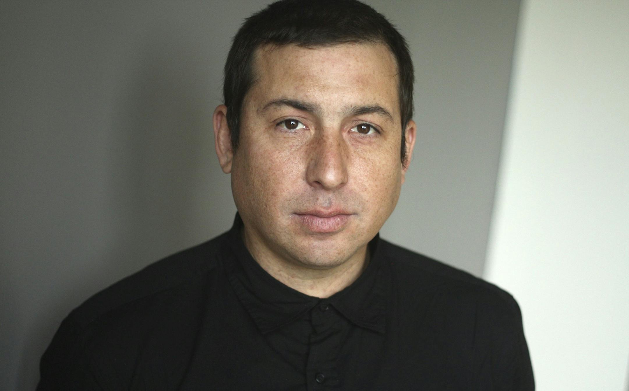 photograph of author Tommy Oragne