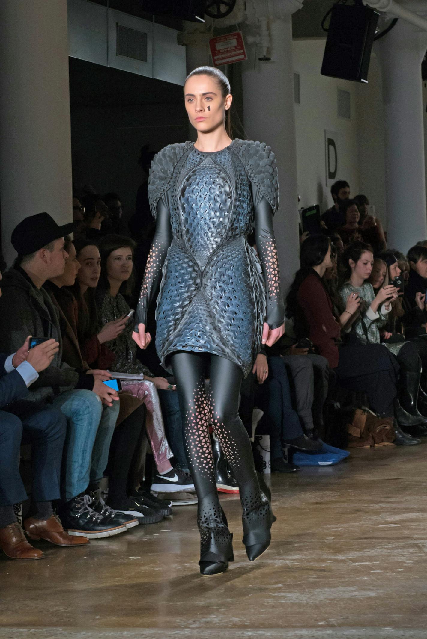 Two new 3-D printed dresses, named &#xeb;Pangolin&#xed; and &#xeb;Harmonograph&#xed; feature unique webbing, interlocking and chainmail like 3-D printed &#xec;fabric&#xee; that is designed to be hard in some areas and soft in others and very fluid and flexible.