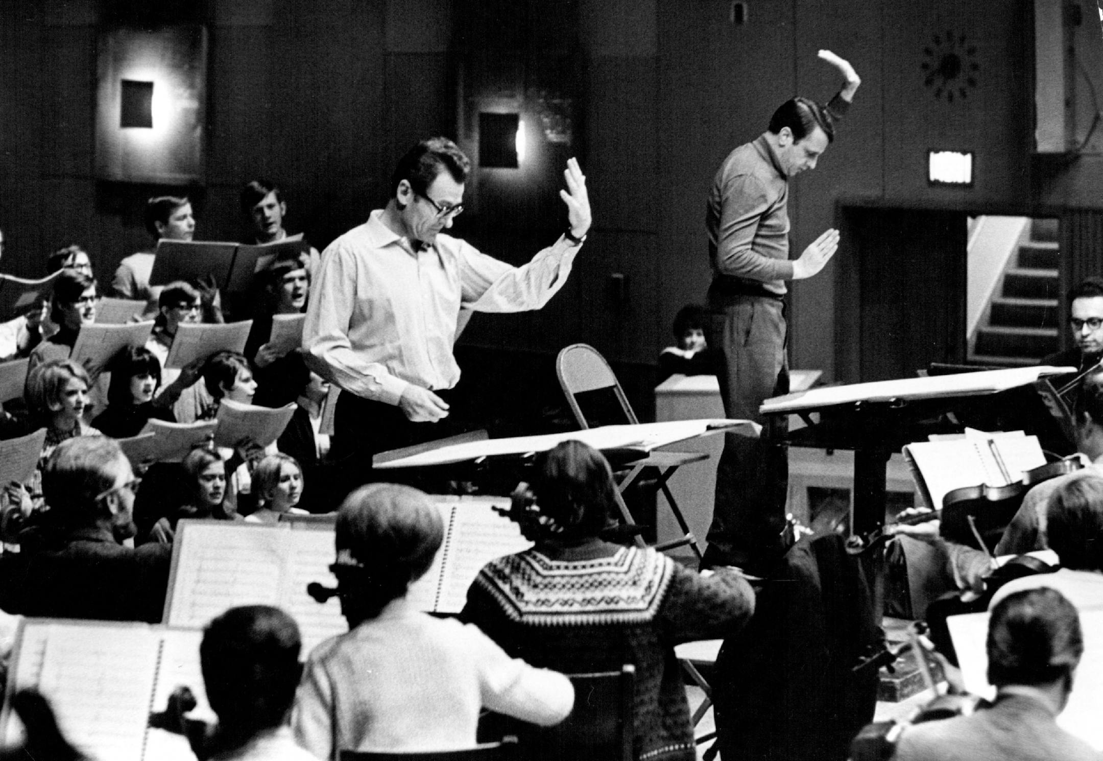 November 20, 1968 SPANISH COMPOSER Christobal Halffter, (right), and Stanlislaw Skrowaczewski, conductor of the Minnesota Orchestra went over Halffter's new cantata during rehearsal In Vocational High school Tuesday. The Secretary-general of the United Nations, U Thant, has invited the Minnesota Orchestra to play the cantata in the General Assembly Hall in New York on Dec. 10 as part of the 20thanniversary of the United Nation's Human Right Day. Halffter's work was commissioned by the United Nat