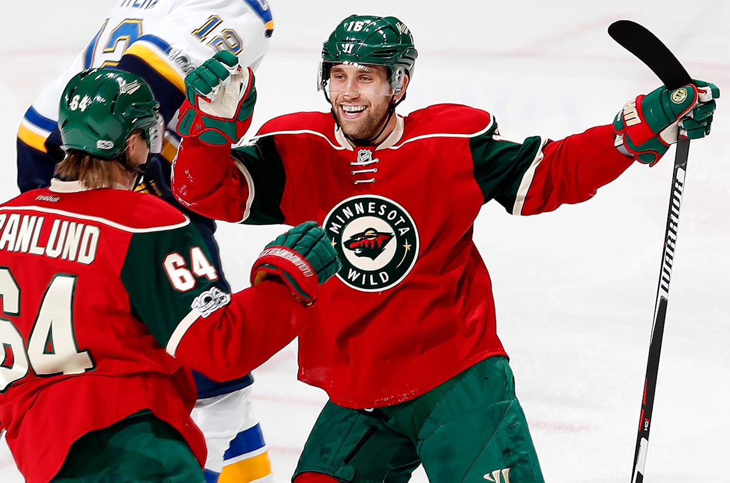 The Wild's Mikael Granlund (64) and Jason Zucker (16) celebrated a goal by Granlund in the third period against the Blues on Thursday. ] CARLOS GONZALEZ � cgonzalez@startribune.com - January 26, 2017, St. Paul, MN, Xcel Energy Center, NHL, Hockey, St. Louis Blues at Minnesota Wild