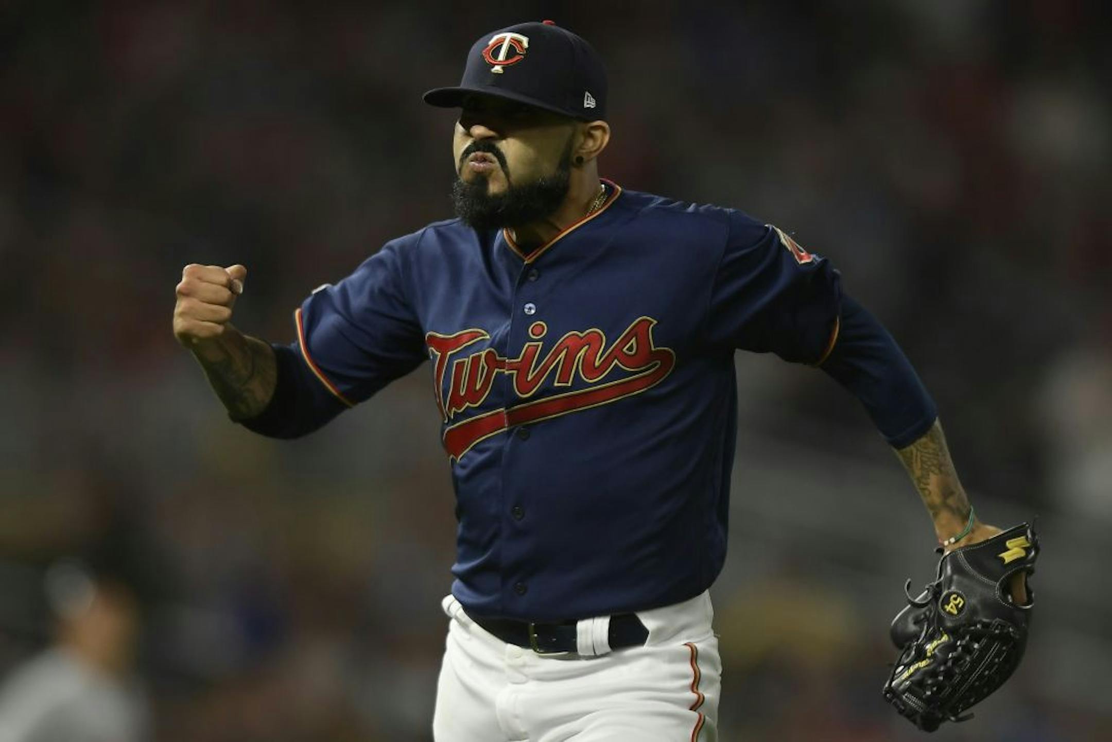 Minnesota Twins relief pitcher Sergio Romo (54) celebrated after the end of the top of the sixth inning against the Cleveland Indians.