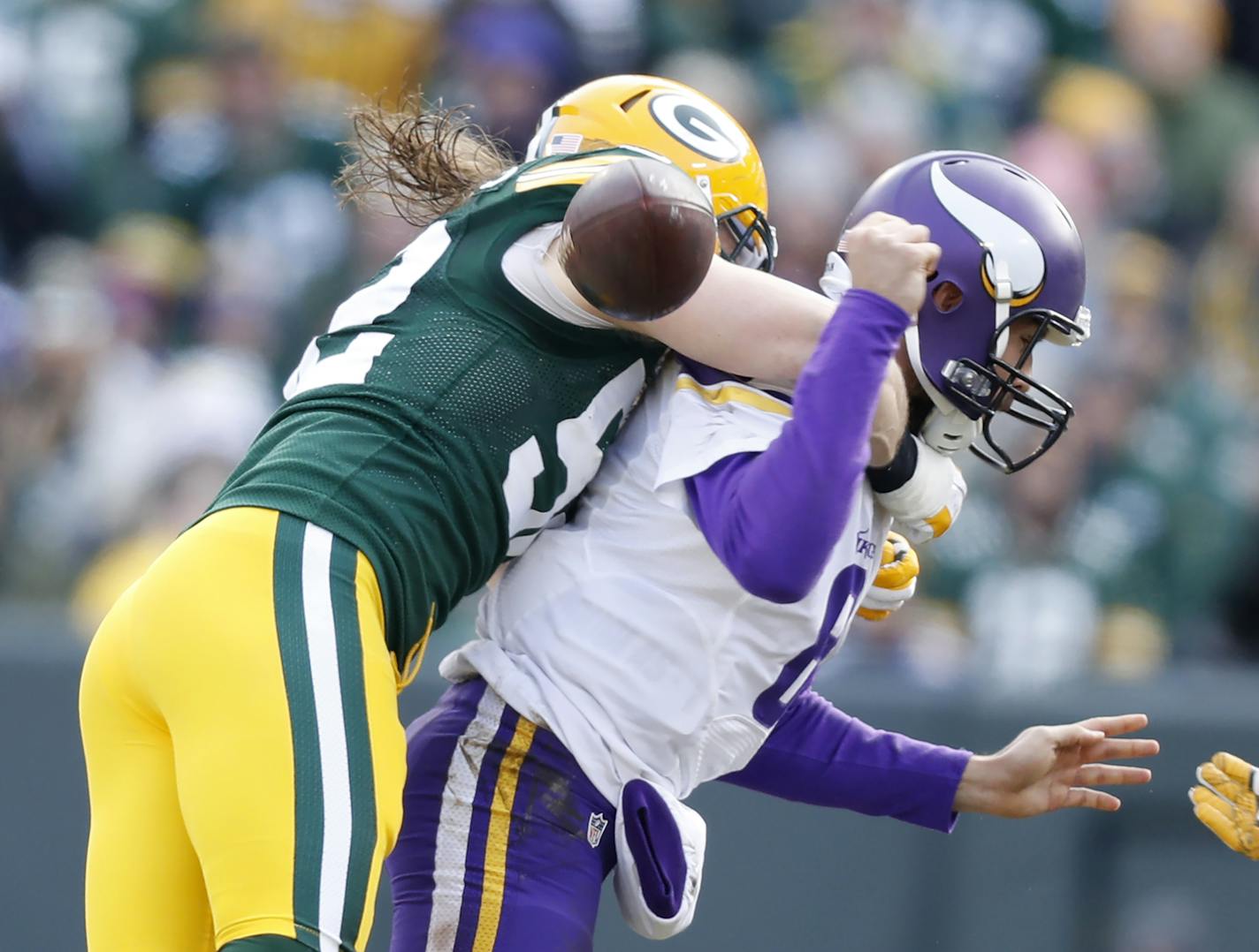 Green Bay Packers outside linebacker Clay Matthews (52) stripped sacked Minnesota Vikings quarterback Sam Bradford (8) in the second quarter at Lambeau Field Saturday December 24,2016 in Green Bay, Wis. ] The Green Bay Packers hosted the Minnesota Vikings at Lambeau Field. Jerry Holt / jerry. Holt@Startribune.com