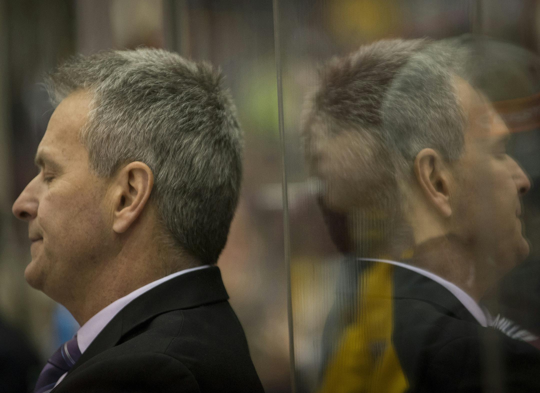 University of Minnesota head coach Don Lucia shows disappointment as Wisconsin scores during the third period. ] (Aaron Lavinsky | StarTribune) The University of Minnesota Gophers hockey team plays against the Wisconsin Badgers on Friday, Jan. 16, 2015 at Mariucci Arena.