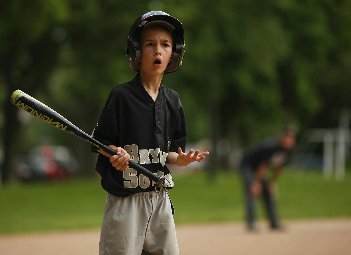 Bryant Square's Levi McCabe Johnston, 8, couldn't believe he was called for a third strike during an at bat against Kenny Park last month. ] JEFF WHEELER &#x2022; jeff.wheeler@startribune.com Bryant Square Park rec center little league team had a game on their home field Wednesday night, June 11, 2014.