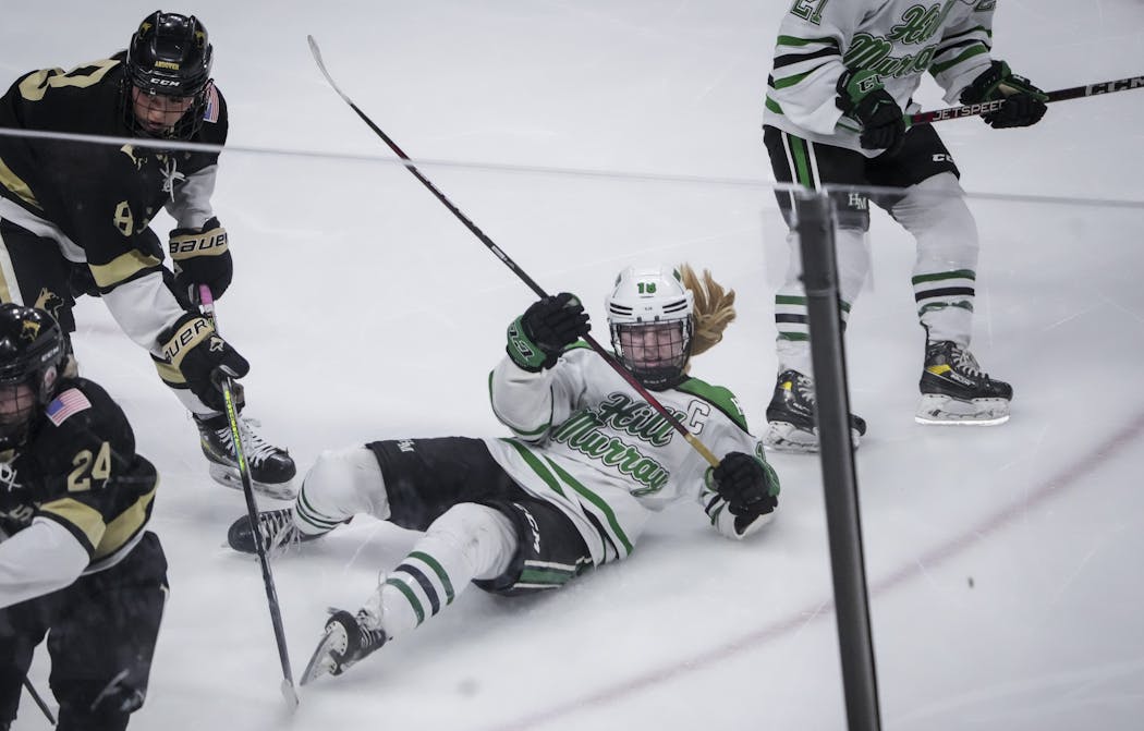 Hill-Murray's Chloe Boreen crashed while pursuing the puck in the third period Friday. 