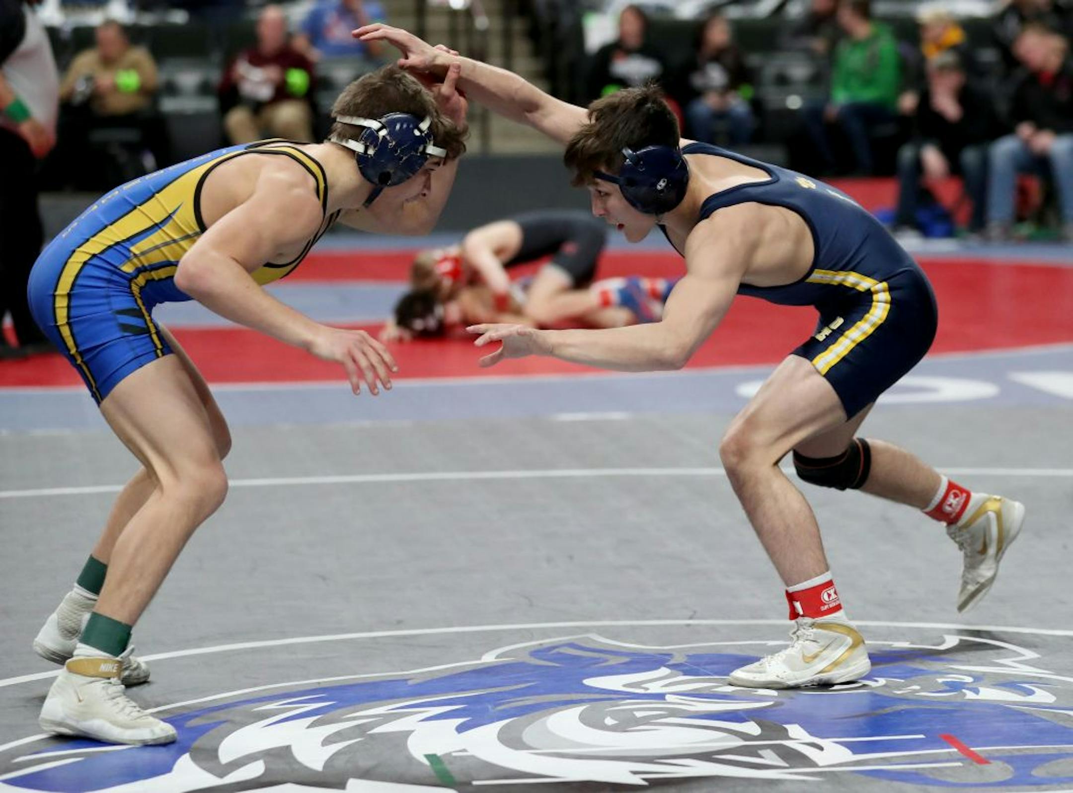In 2A quarter finals at 120 pounds Joey Thompson of Totino-Grace, right, wrestled Jayden Mcleren of Big Lake. Thompson went on to win Friday, Feb. 28, 2020, at the Xcel Energy Center in St. Paul, MN.