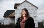 Realtor Michelle Fitzpatrick stood for a portrait in front of an under-construction home in the Summerlin neighborhood of Woodbury Wednesday afternoon