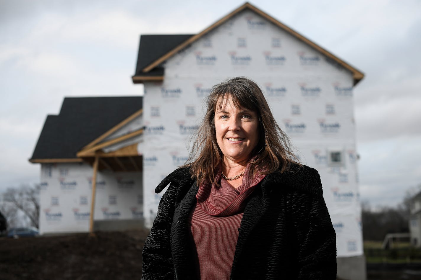 Realtor Michelle Fitzpatrick stood for a portrait in front of an under-construction home in the Summerlin neighborhood of Woodbury Wednesday afternoon. ] AARON LAVINSKY &#xef; aaron.lavinsky@startribune.com Home sales in the Twin Cities metro during October were flat compared with last year, but not for lack of interest. House listings were down, limiting options for an abundance of first-time buyers, according to a monthly sales report from the Minneapolis Area Association of Realtors. Sales of