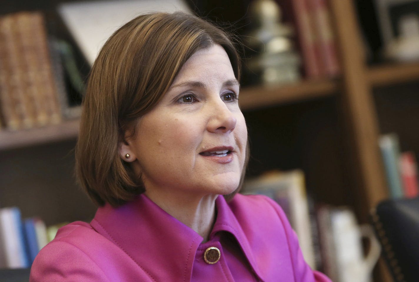 FILE - In this March 12, 2018, file photo, Minnesota Attorney General Lori Swanson speaks during an interview at the Capitol in St. Paul. Swanson concedes defeat in a three-way Democratic primary for Minnesota governor. Early returns in the primary Tuesday, Aug. 14, showed Swanson trailed U.S. Rep. Tim Walz and state Rep. Erin Murphy considerably. (AP Photo/Jim Mone, File)