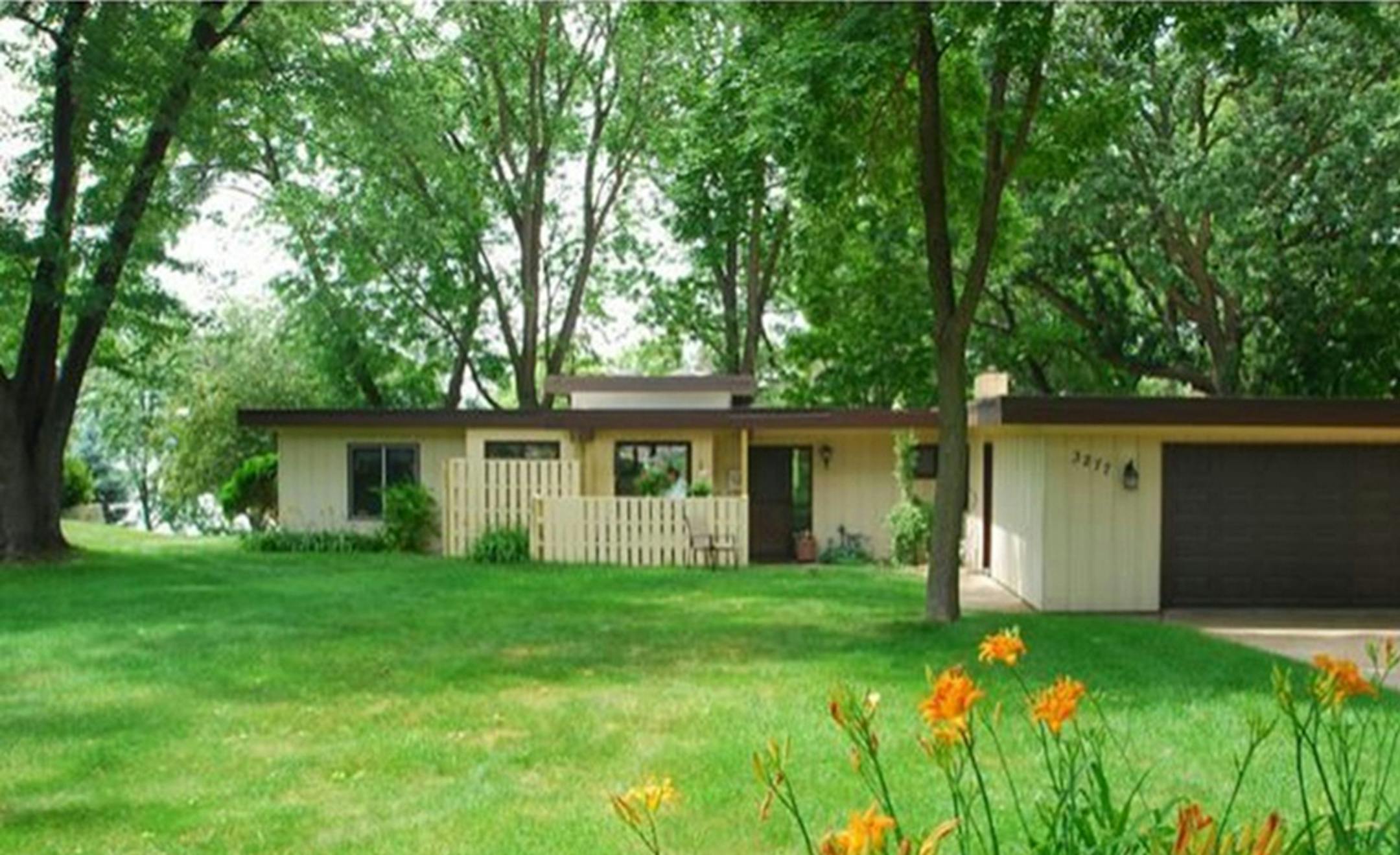 ... Shoreview
Built in 1950, this four-bedroom, two-bath house has 2,103 finished square feet and features four bedrooms on one level, fireplace, two-car attached garage and 142 feet of shoreline on Owasso Lake. Listed by David Bartel, Transition Properties Inc., 651-777-0000.