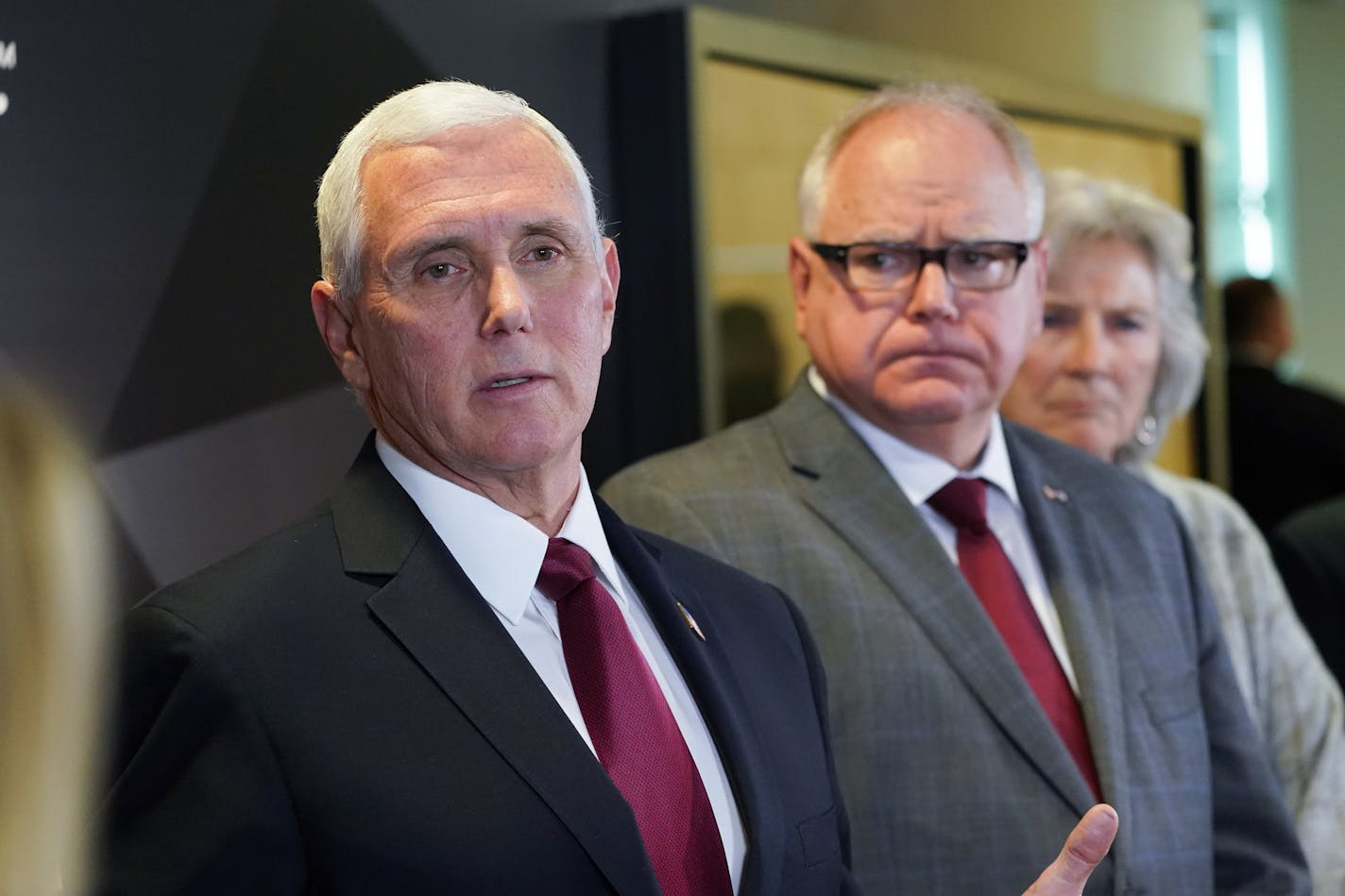 Vice President Mike Pence and Minnesota Gov. Tim Walz spoke to the press after Pence visited 3M in Maplewood in March. On the right is Health Commissioner Jan Malcolm.