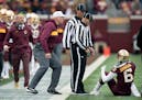 Gophers offensive line coach Brian Callahan, seen here expressing himself to a referee during a 2018 contest, gained two new players for his position 