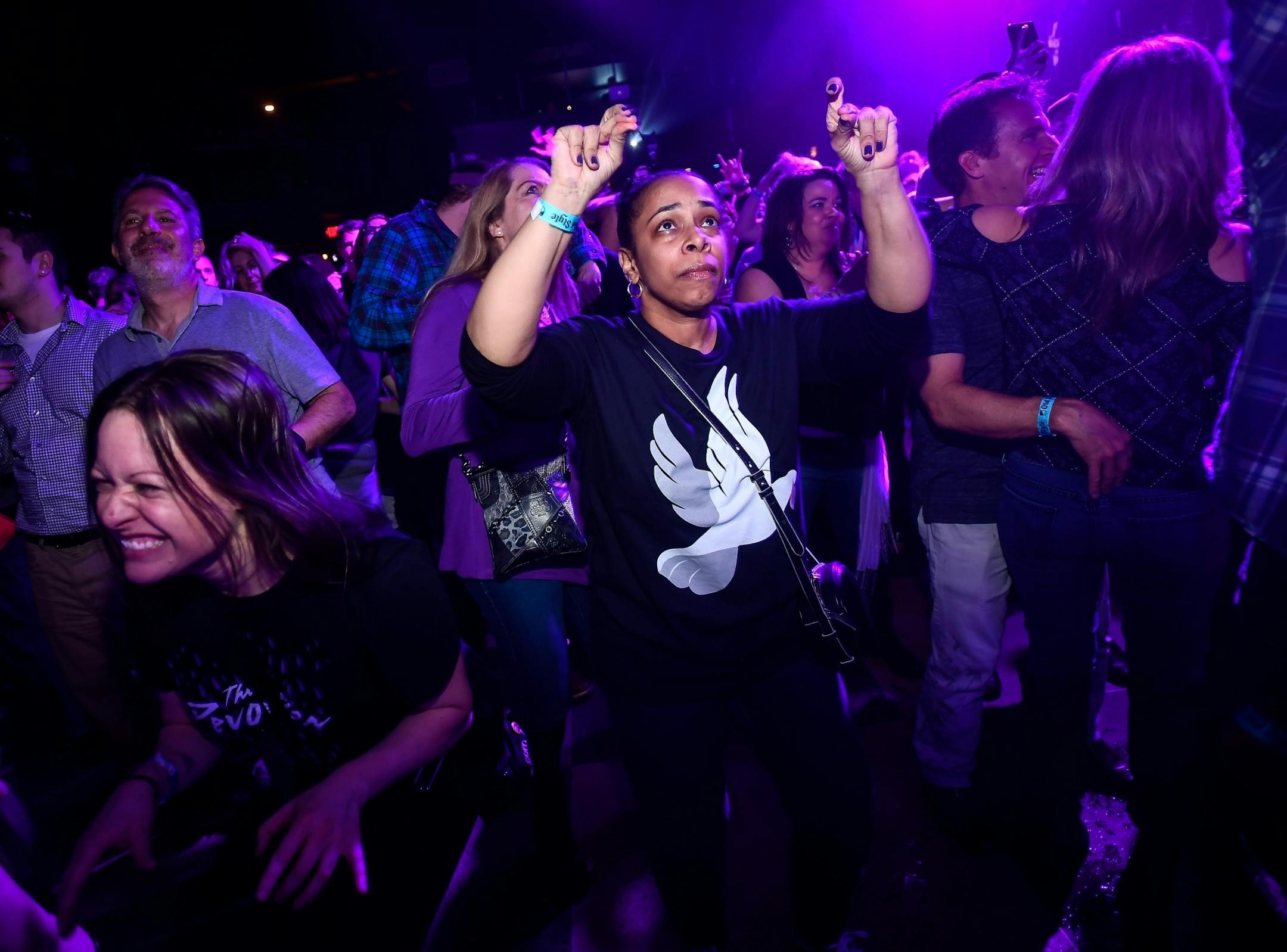 Holly Seward, of West Orange, New Jersey, danced during Friday night's all-night dance party commemorating Prince at First Avenue.