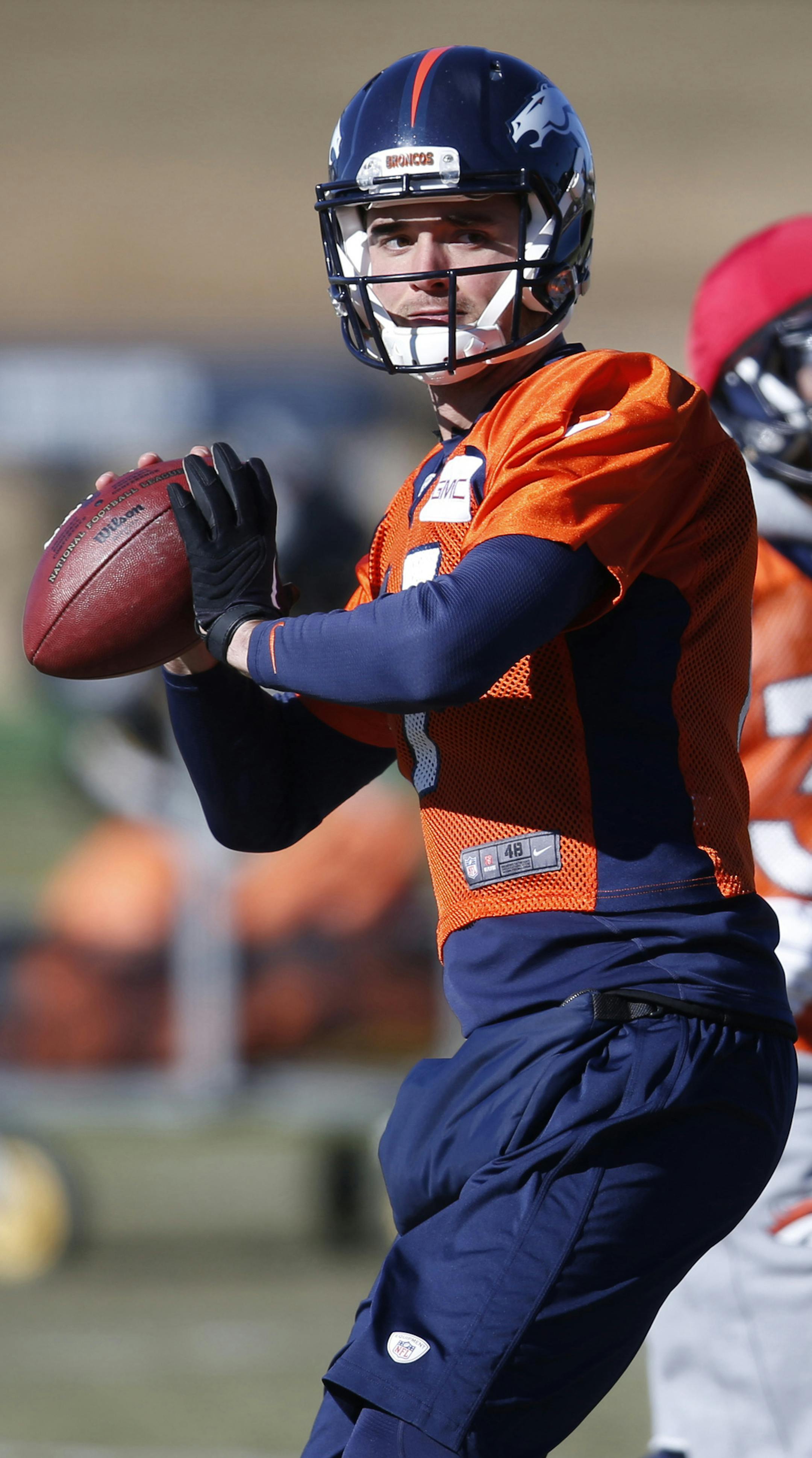 FILE - In this Jan. 21, 2016, file photo, Denver Broncos quarterback Brock Osweiler passes during an NFL football practice at the team's headquarters in Englewood, Colo. Now that the Broncos have bid their farewells to quarterback Peyton Manning, who retired on Monday, March 7, the team hopes that his backup, Osweiler, will stay on to take up the reins of Super Bowl champions' offense. (AP Photo/David Zalubowski, File)