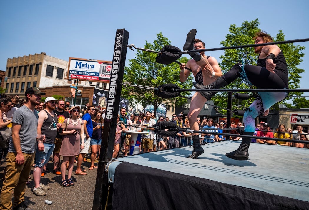 Wrestlers Griffin Gau and Darin Corbin competed in a F1RST Wrestling match during a Minneapolis Open Streets event in 2019.