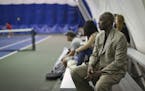 Minneapolis Public Schools Athletic Director Trent Tucker watched a tennis match in 2013. He resigned from his post on Thursday.