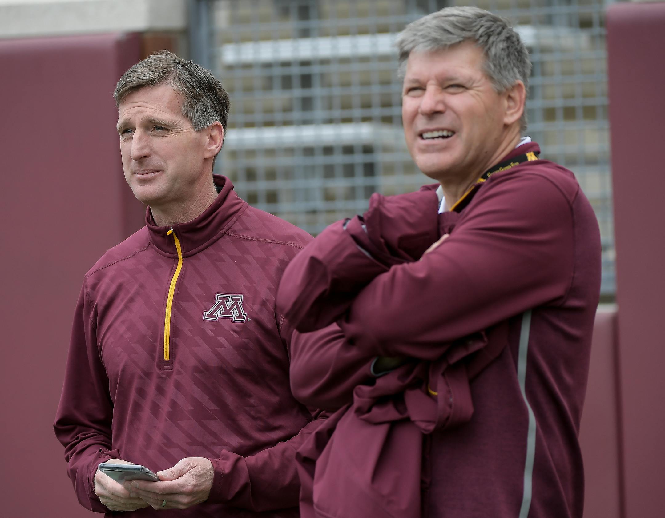 University of Minnesota Athletic Director Mark Coyle joked with athletics fundraiser Randy Handel on the sidelines of Minnesota football's spring game in mid-April. ] AARON LAVINSKY &#xef; aaron.lavinsky@startribune.com University of Minnesota Athletics fundraiser Randy Handel met with university president Eric Kaler and athletic director Mark Coyle on the sideline of Minnesota football's spring game on Saturday, April 15, 2017 at TCF Bank Stadium in Minneapolis, Minn.