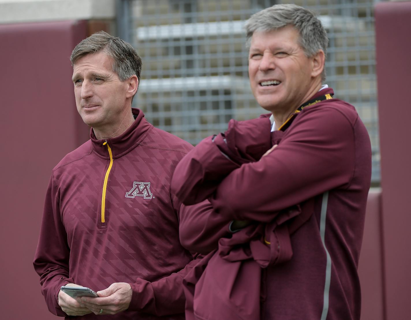 University of Minnesota Athletic Director Mark Coyle joked with athletics fundraiser Randy Handel on the sidelines of Minnesota football's spring game in mid-April. ] AARON LAVINSKY &#xef; aaron.lavinsky@startribune.com University of Minnesota Athletics fundraiser Randy Handel met with university president Eric Kaler and athletic director Mark Coyle on the sideline of Minnesota football's spring game on Saturday, April 15, 2017 at TCF Bank Stadium in Minneapolis, Minn.