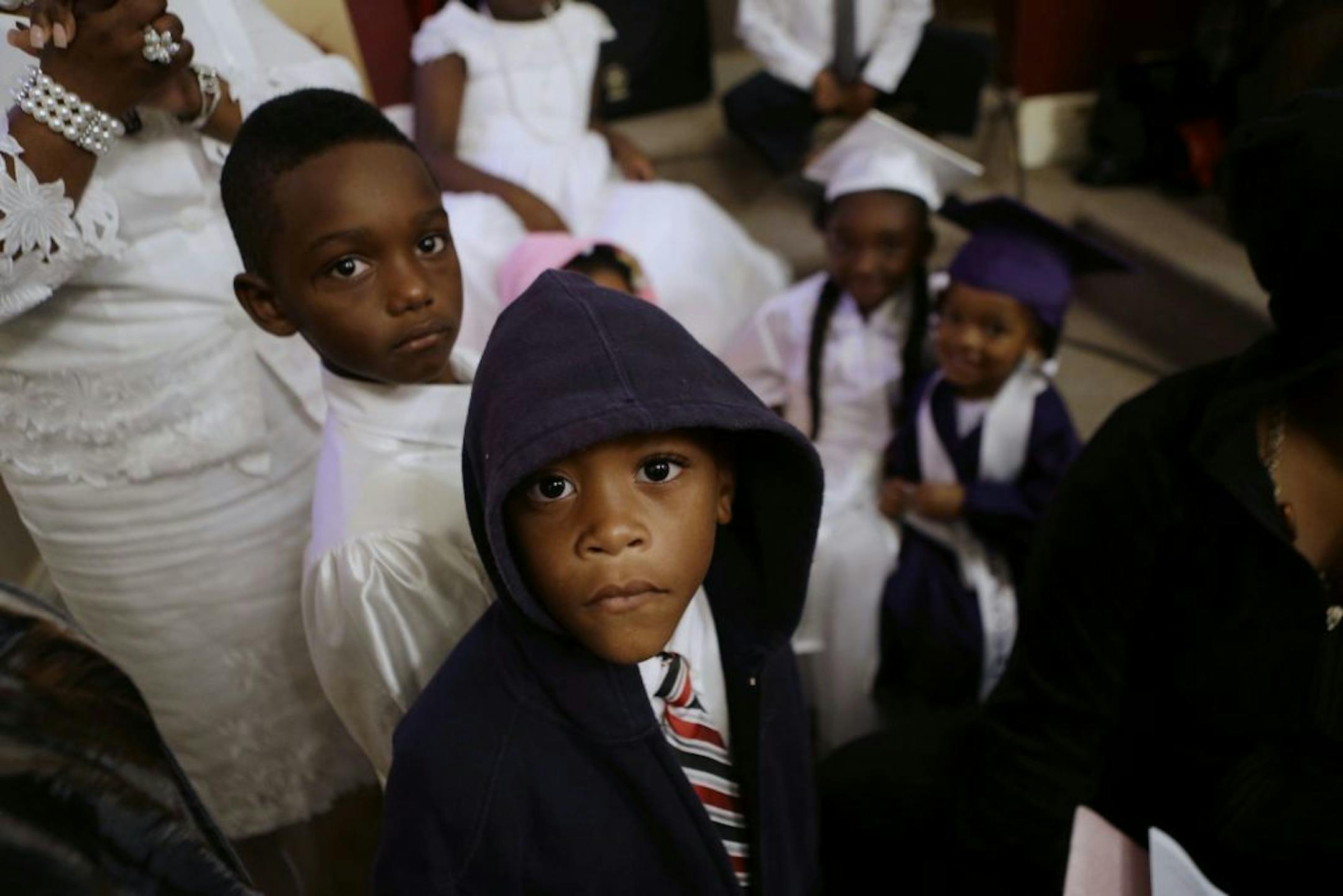 AP10ThingsToSee - Jaquin Nelson, 6, wears a hooded sweatshirt in reaction to a Florida jury's acquittal of George Zimmerman, who was found not guilty of second degree murder in the shooting death of unarmed teenager Trayvon Martin, during a church service in New Orleans, Sunday, July 21, 2013.
