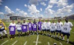 Vikings players posed with players from Tottenham Hotspur at the new TCO Performance Center in Eagan.