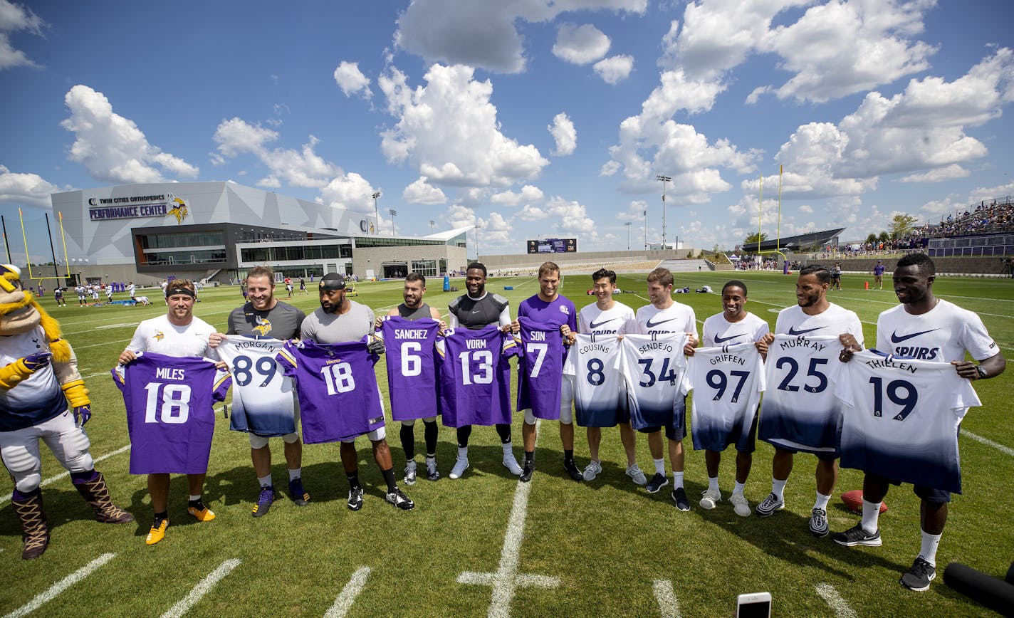 Vikings players posed with players from Tottenham Hotspur at the new TCO Performance Center in Eagan.