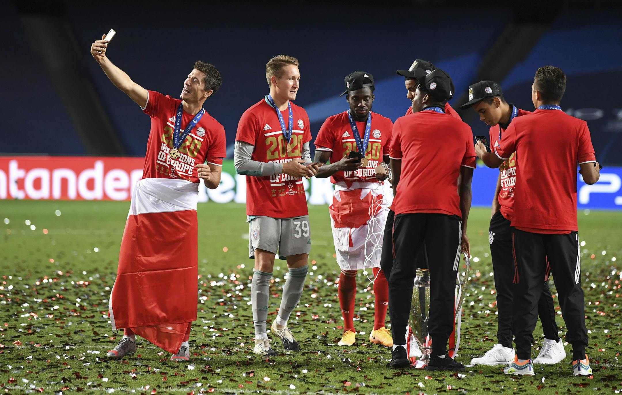Bayern's Robert Lewandowski, left, makes a selfie after the Champions League final soccer match on Aug. 23 between Paris Saint-Germain and Bayern Munich at the Luz stadium in Lisbon, Portugal.