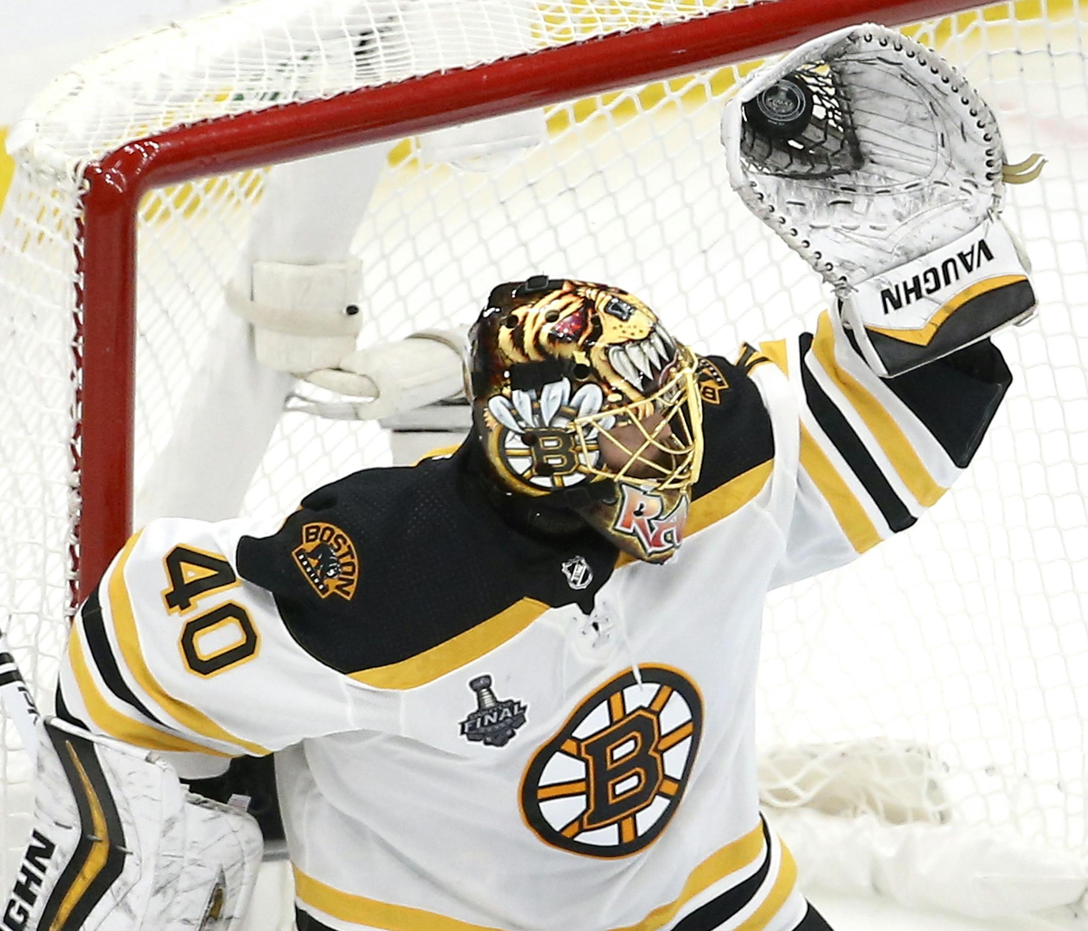 Boston Bruins goaltender Tuukka Rask, of Finland, gloves a shot against the St. Louis Blues during the second period of Game 6 of the NHL hockey Stanley Cup Final Sunday, June 9, 2019, in St. Louis. (AP Photo/Scott Kane)