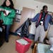 St. Stephen's Human Services director Monica Nilsson helped Darrell Walton get situated in his new apartment at Evergreen Residence for the homeless. 