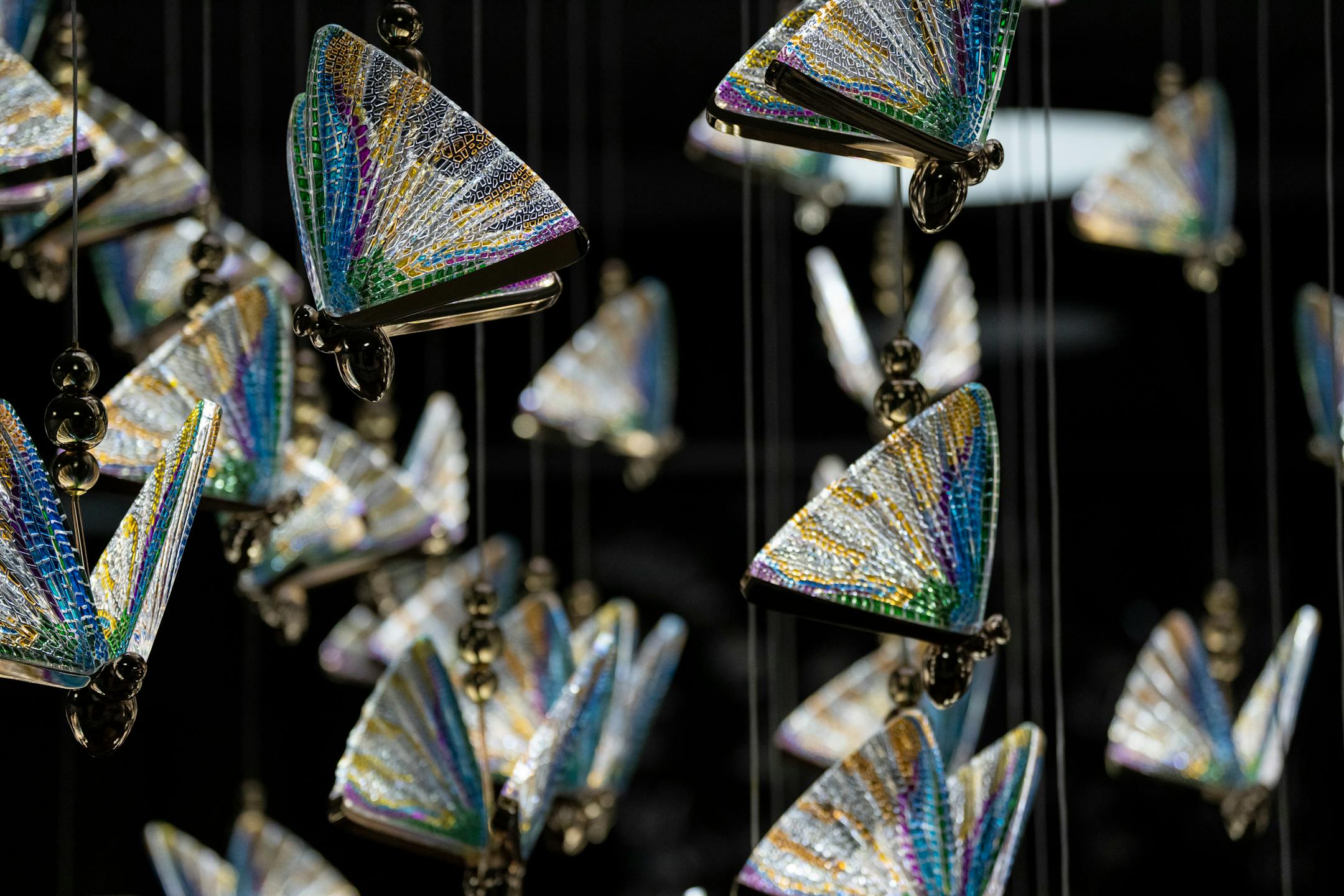 A chandelier of butterflies hangs over the entrance of the new Asia Mall.