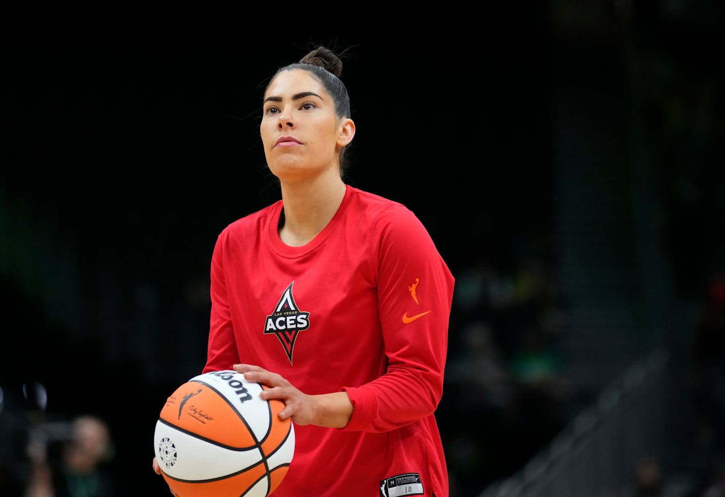 Las Vegas Aces guard Kelsey Plum warms up before facing the Seattle Storm in a WNBA basketball game Saturday, May 20, 2023, in Seattle. The Aces won 105-64. (AP Photo/Lindsey Wasson)