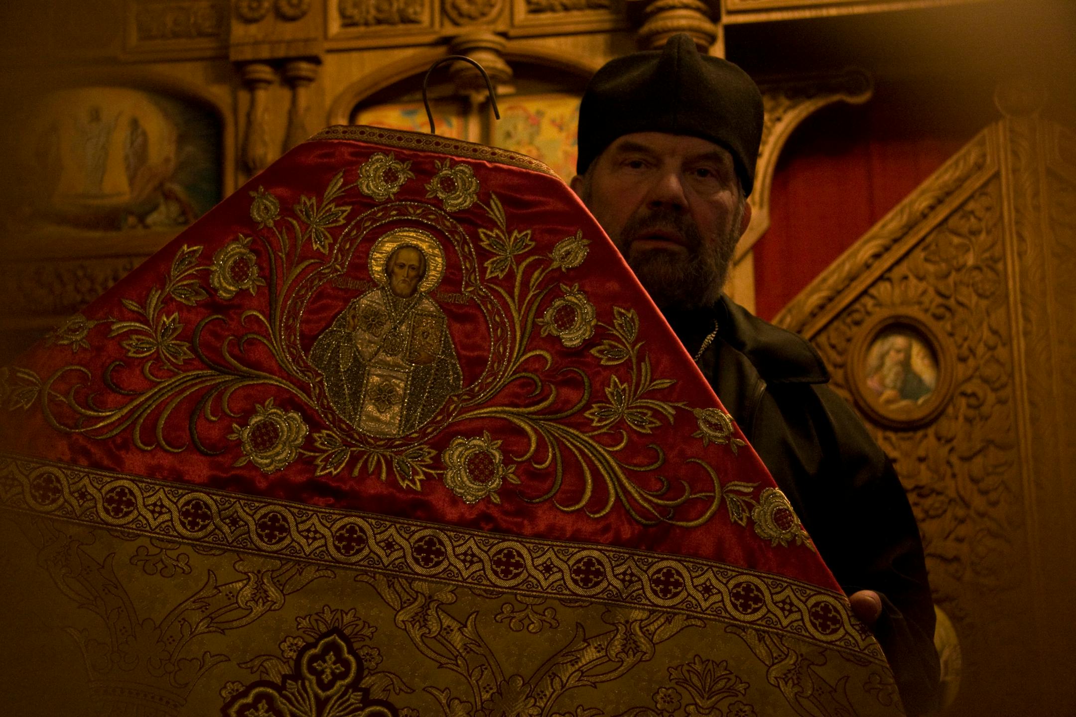 Father Valery Shvetsvov, the village priest in Pavlovsk, showed off vestments made by his wife, Zina.