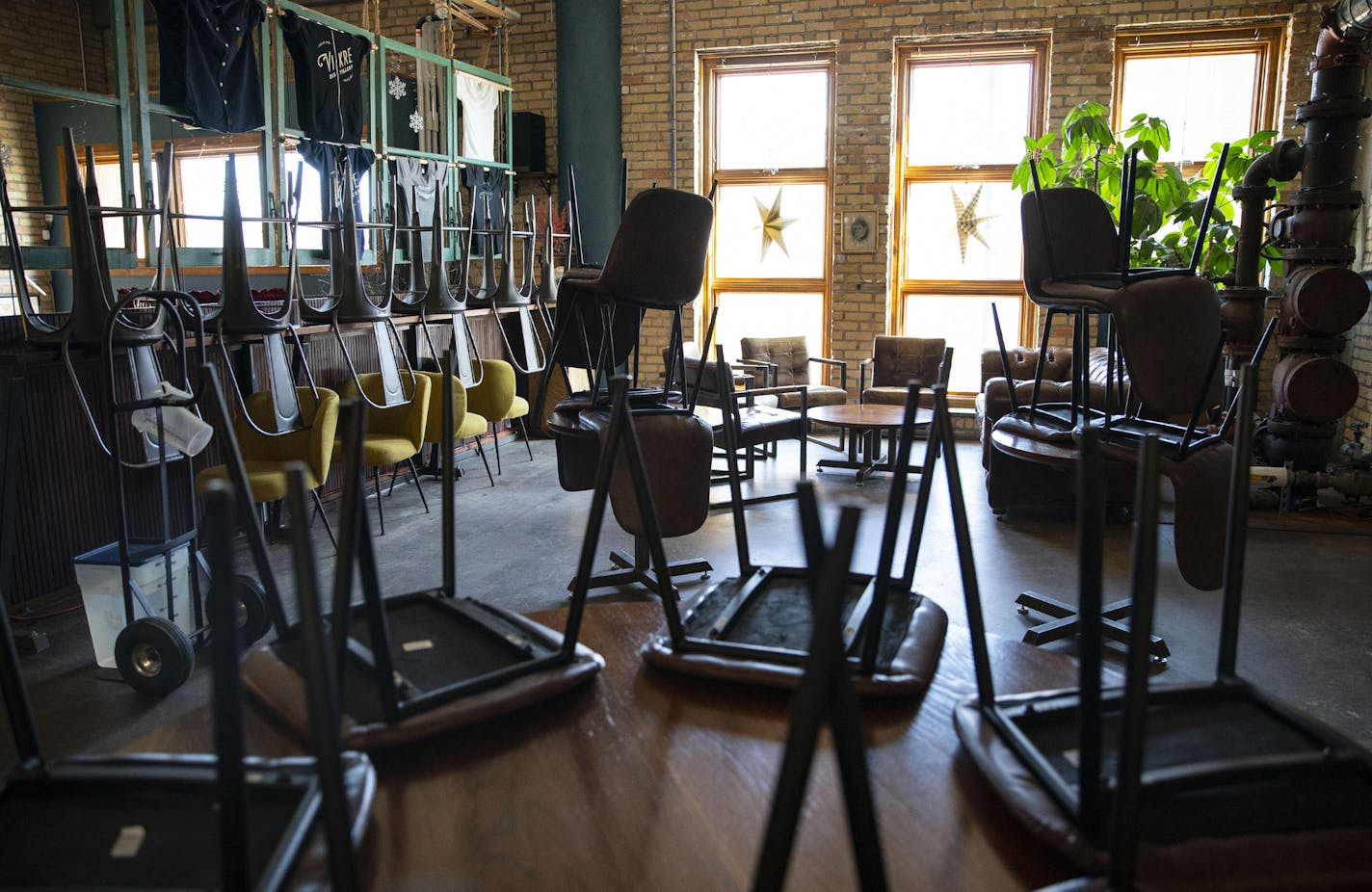 Vikre Distillery sat empty with chairs stacked on tables following Governor Walz's order to close all restaurants and bars in March.
ALEX KORMANN &#x2022; alex.kormann@startribune.com