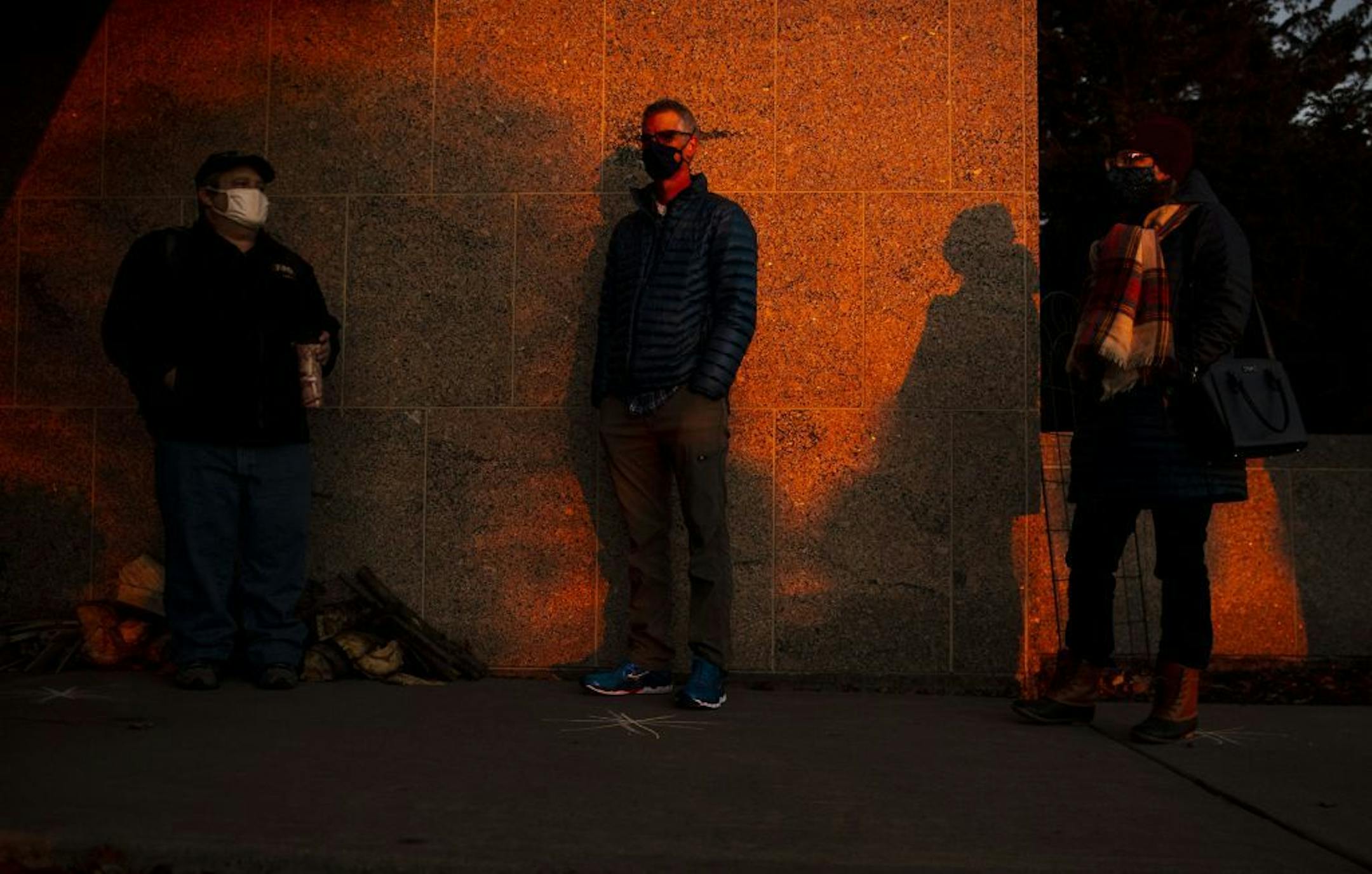 A long line of voters formed outside of First United Methodist Church as the sun rose over Lake Superior in Duluth on Tuesday morning.