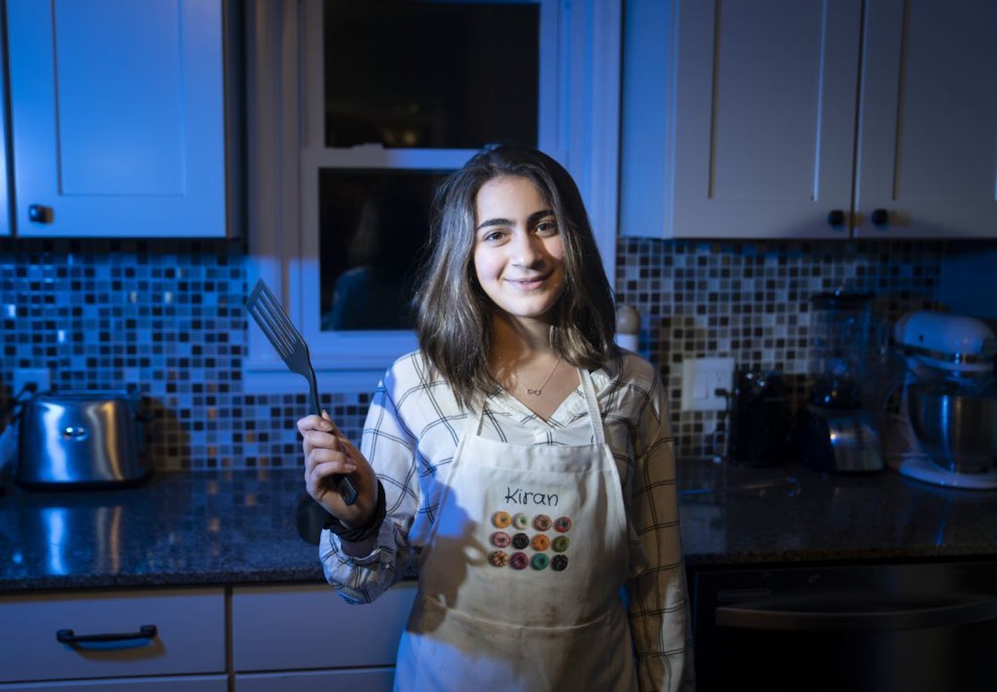 Thirteen-year-old Kiran Alwy, runner-up on "Chopped Junior," in the kitchen of her home in St. Louis Park.