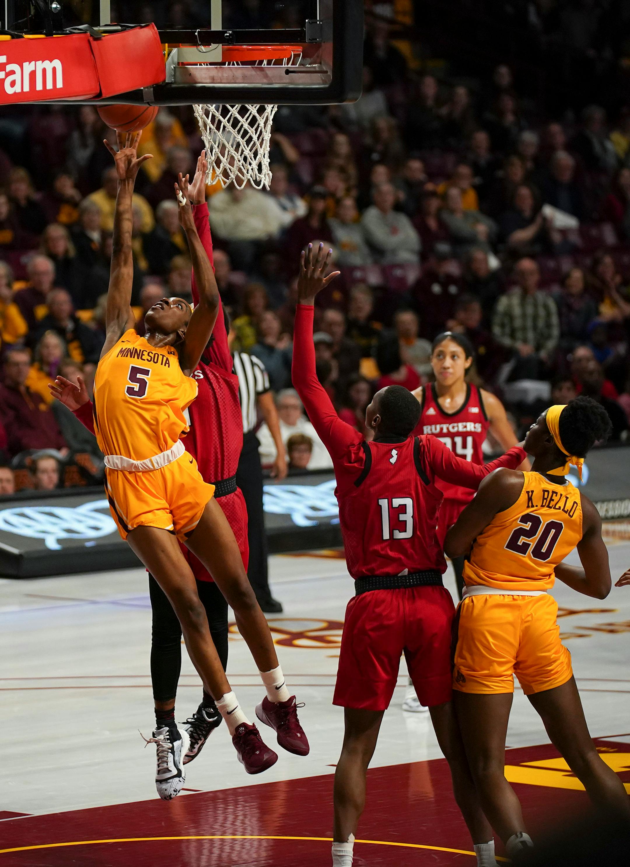 Minnesota Gophers forward Taiye Bello (5) put up a second half shot to tie the game 61-61 with 33 seconds left. She finished with 19 points.