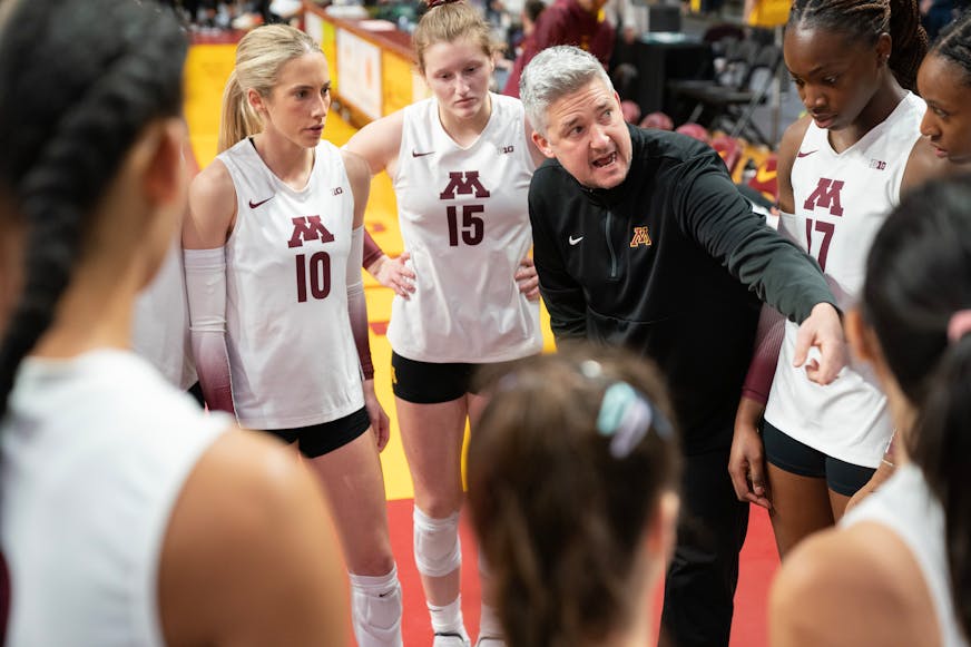 Minnesota Women's Volleyball head coach Keegan Cook speaks to his team before taking on Purdue Friday, Nov. 10, 2023, at Maturi Pavilion at the University of Minnesota in Minneapolis, Minn. ]